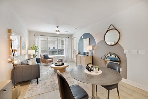 Model Sandalwood Design Package Dining and Living Room at 1810 Main Apartments in Houston TX