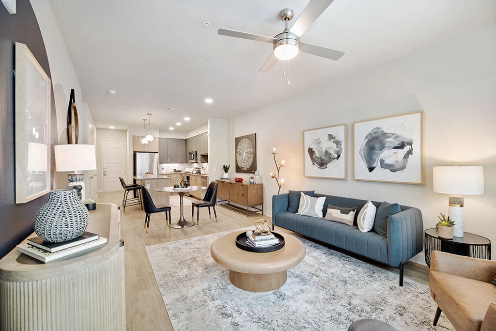 Model Sandalwood Design Package Living Room at 1810 Main Apartments in Houston TX