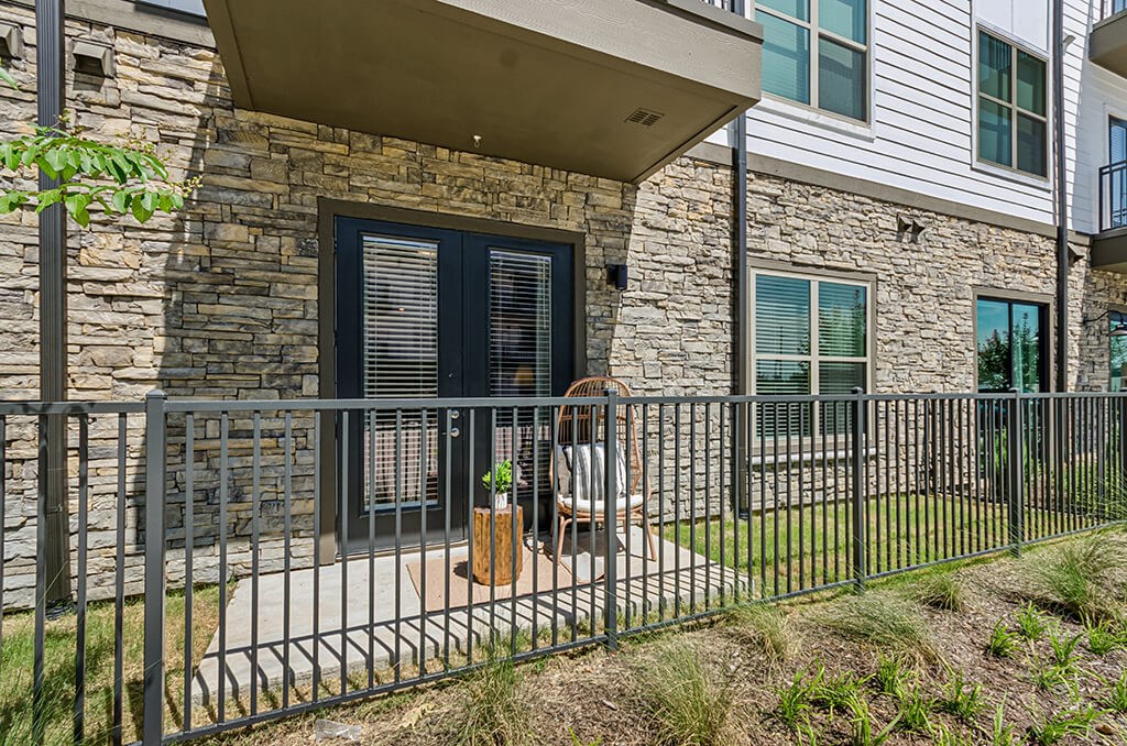 Model Slate Design Package Patio at The Waylon Apartments and Townhomes in McKinney TX