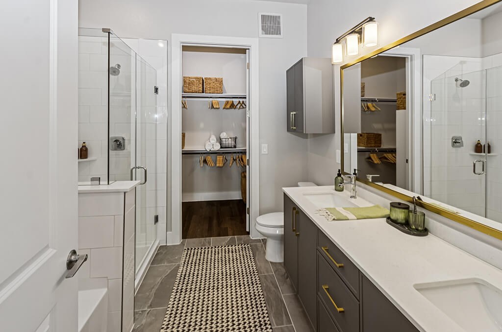 Model Slate Design Package Primary Bathroom at The Waylon Apartments and Townhomes in McKinney TX