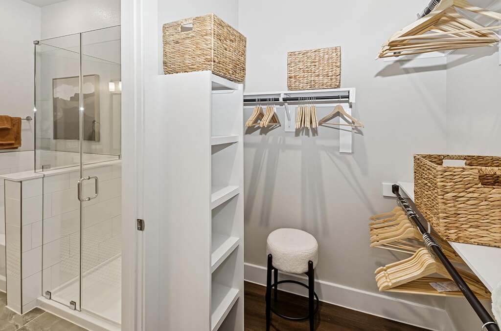 Model Slate Design Package Primary Closet at The Waylon Apartments and Townhomes in McKinney TX