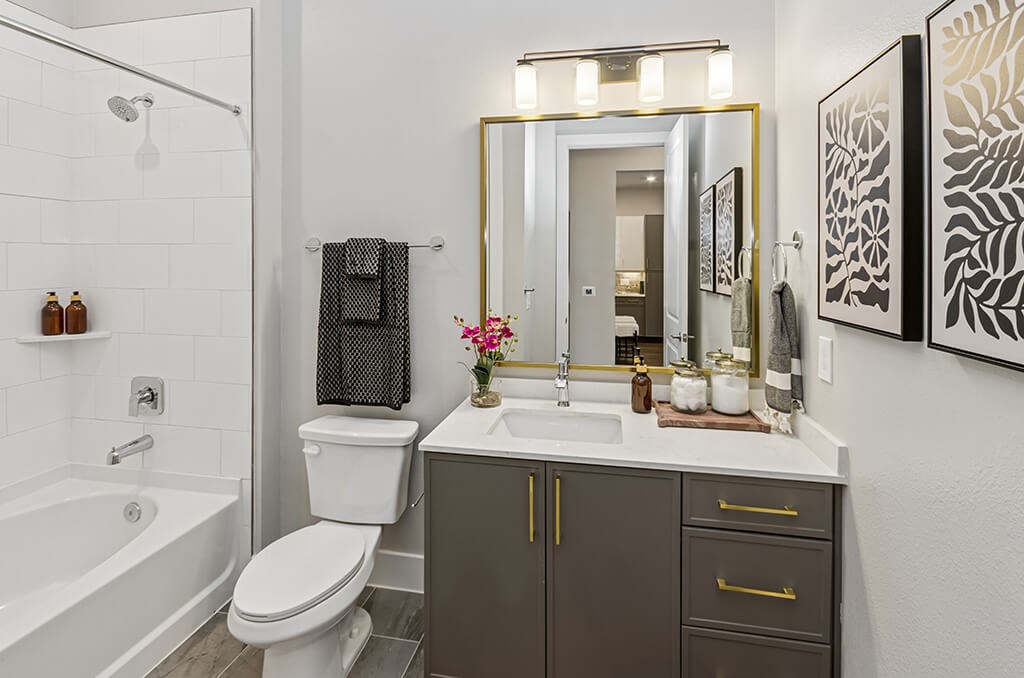 Model Slate Design Package Secondary Bathroom at The Waylon Apartments and Townhomes in McKinney TX