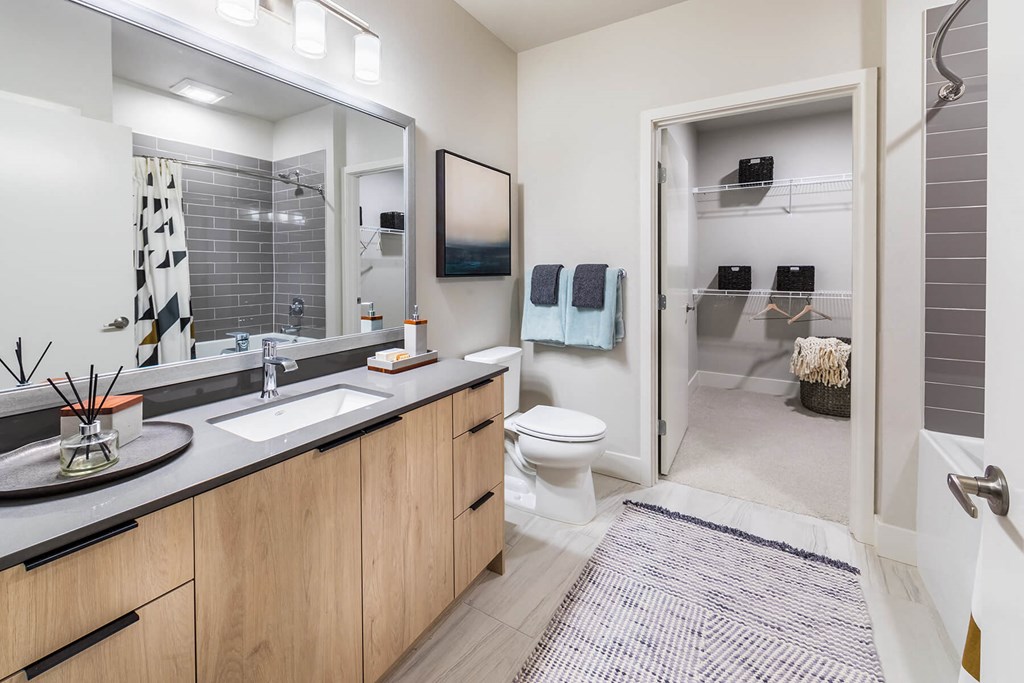 Bathroom with closet at Aspect at Totem Lake Apartments in Kirkland WA