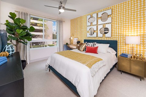 Bedroom with ceiling fan at Avel Apartment Homes in Orange CA