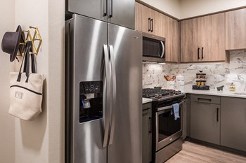 Model Slate Finish Package Kitchen Appliances at Aura Apartment Homes in Orange CA - Photo Gallery 33