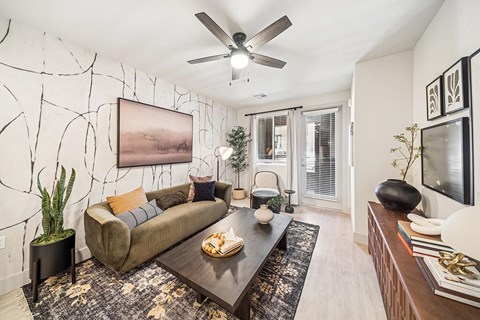 Model Snow Design Package Living Room at Olivean Apartments in Broomfield CO