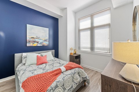 Bedroom with hardwood flooring at Bradley Braddock Road Station Apartments in Alexandria VA