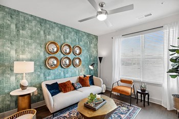 Model living room at Belhaven Apartments in Alexandria VA - Photo Gallery 6