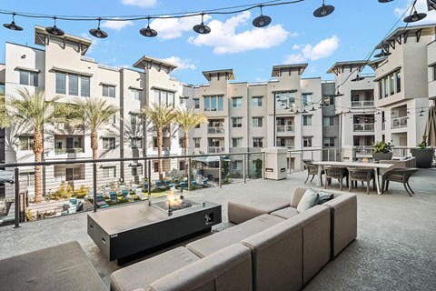 Patio and fire table at District at Scottsdale Apartments in Scottsdale AZ