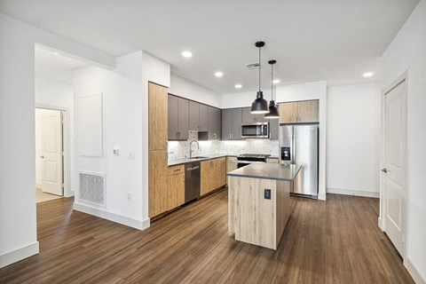 View of kitchen from living room at The Braydon Apartments in Napa CA