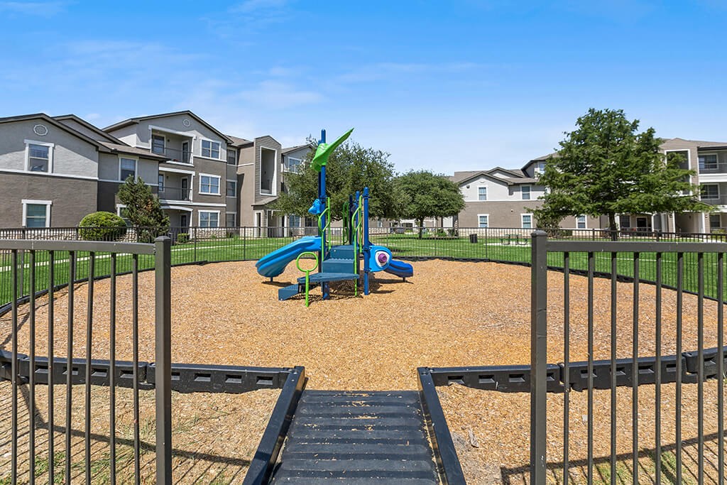 Playground entrance at Bonito Parque Apartments in San Antonio TX