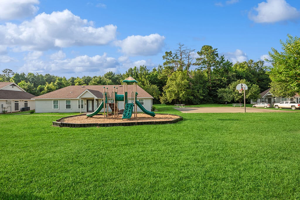 Playground at Dayton Park Apartments in Dayton, TX