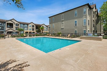 Outdoor pool at Parkway Senior Apartments in Pasadena TX - Photo Gallery 7