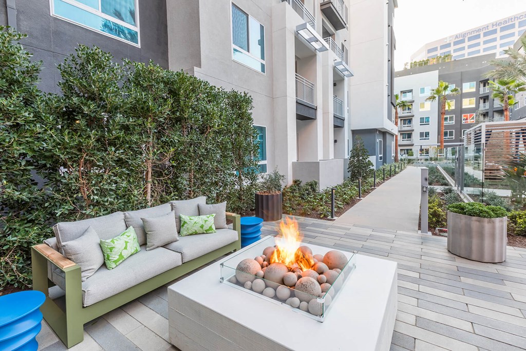 Pool Vibe Small Fire Table at Vita Apartment Homes in Orange, CA