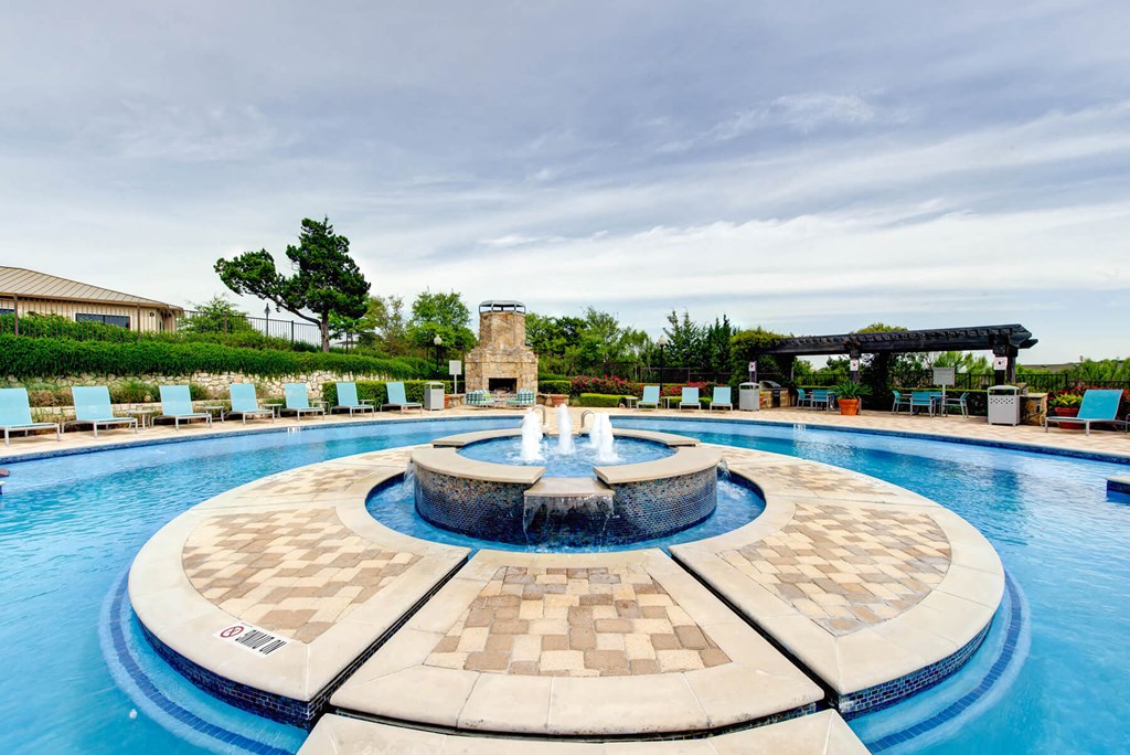 Pool Water Feature and View at Callista Hill Country Apartments in Austin TX