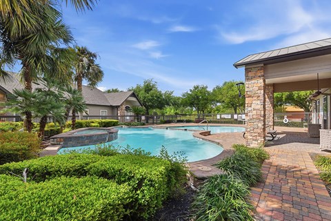 Pool and spa area at Almeda Park Apartments in Houston TX