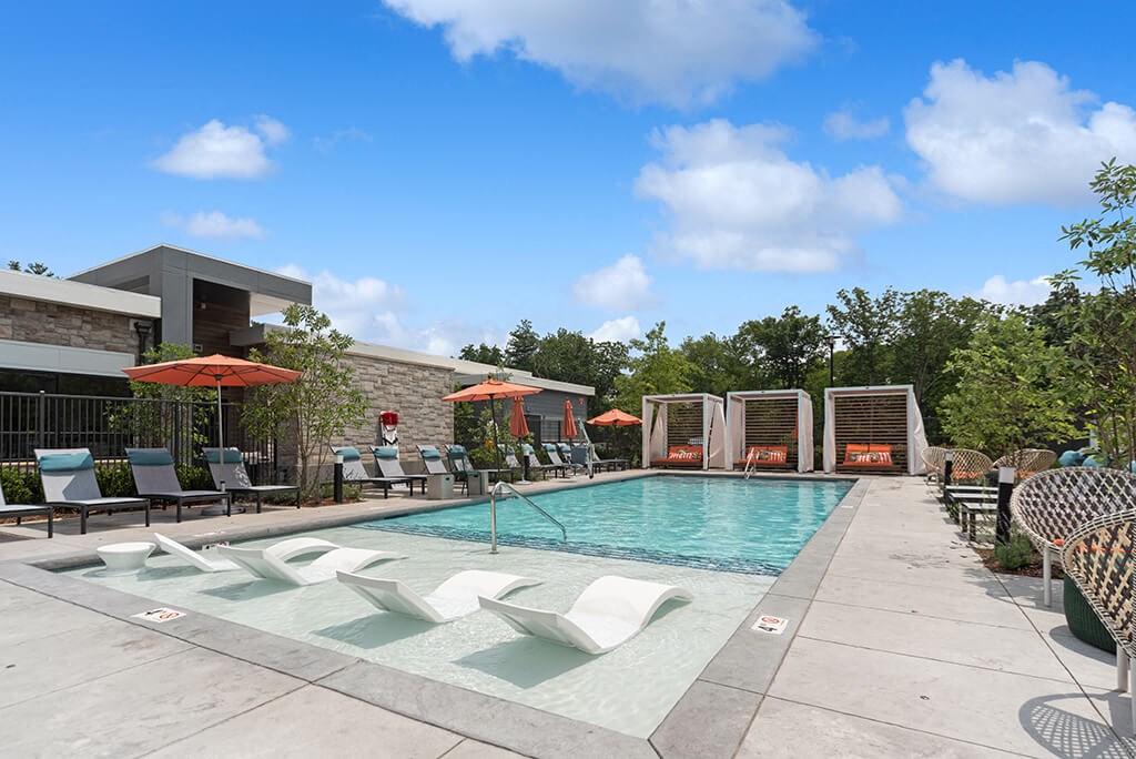 Pool and cabanas at The Quill Apartments in Milford MA