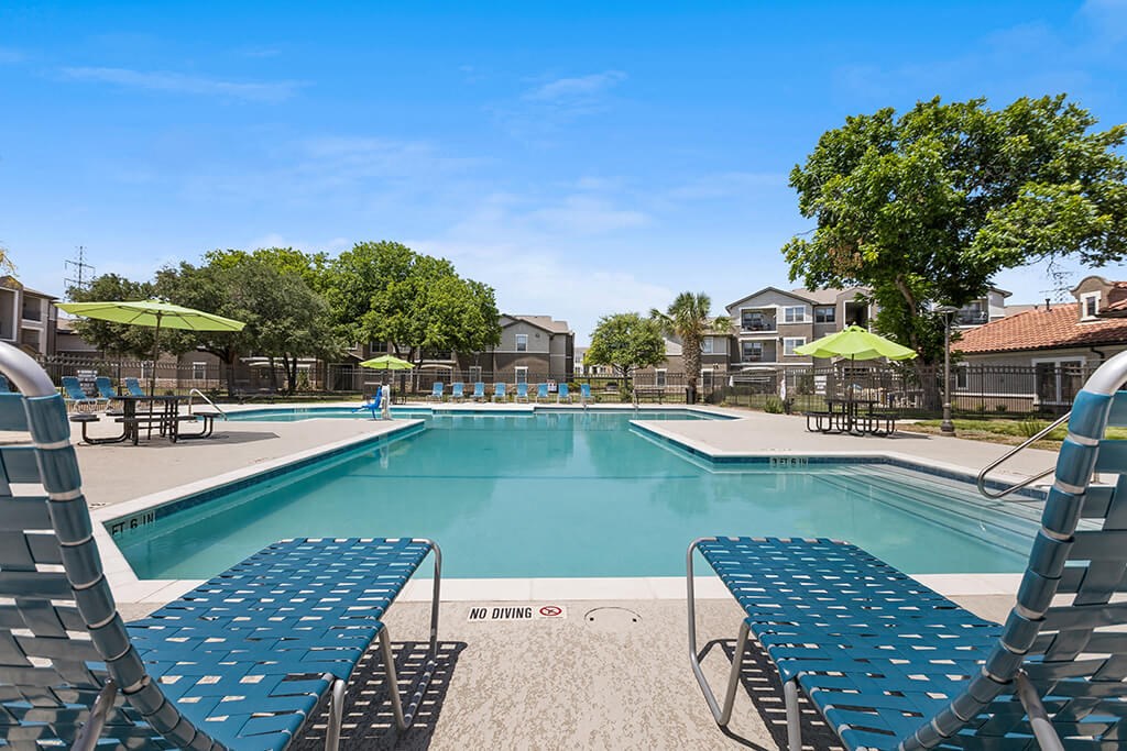 Outdoor swimming pool at Bonito Parque Apartments in San Antonio TX