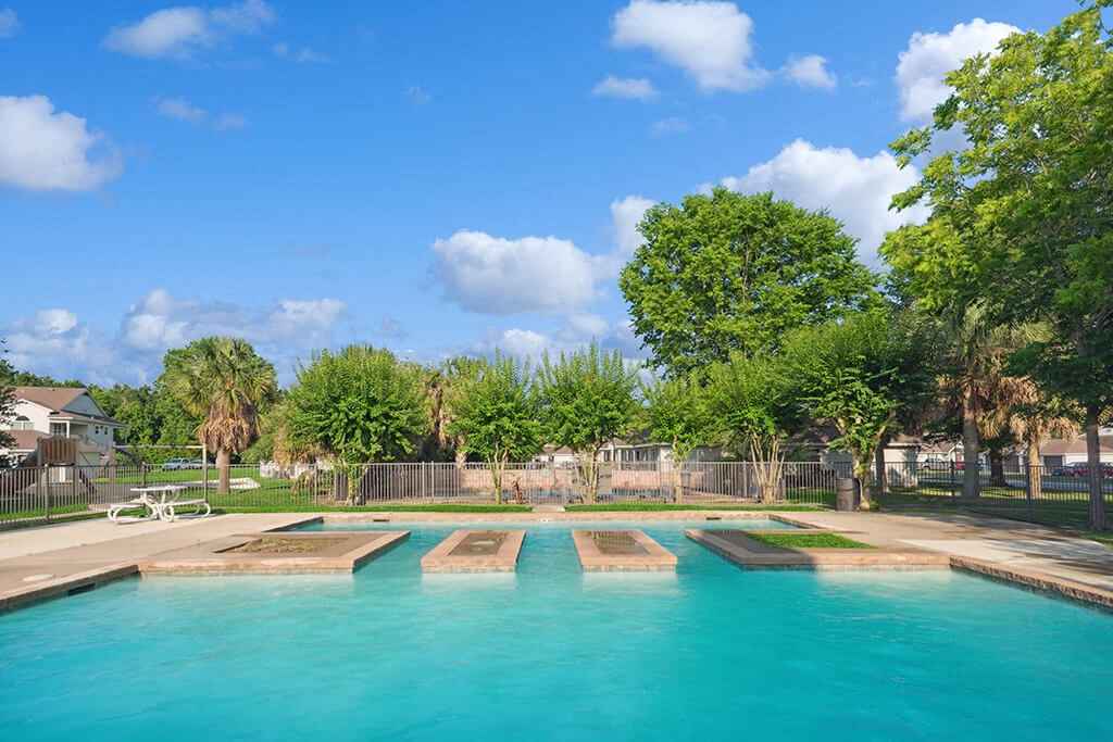 Pool at Dayton Park Apartments in Dayton, TX