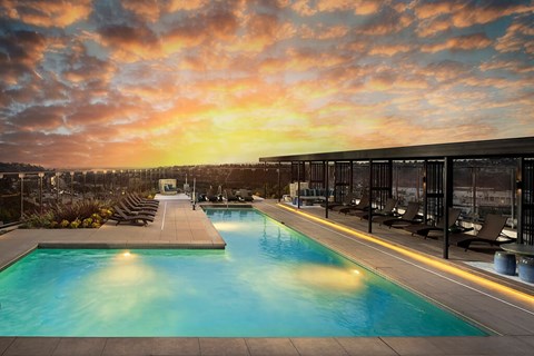 Pool at dusk at Chromatic Flats Apartments in San Diego CA