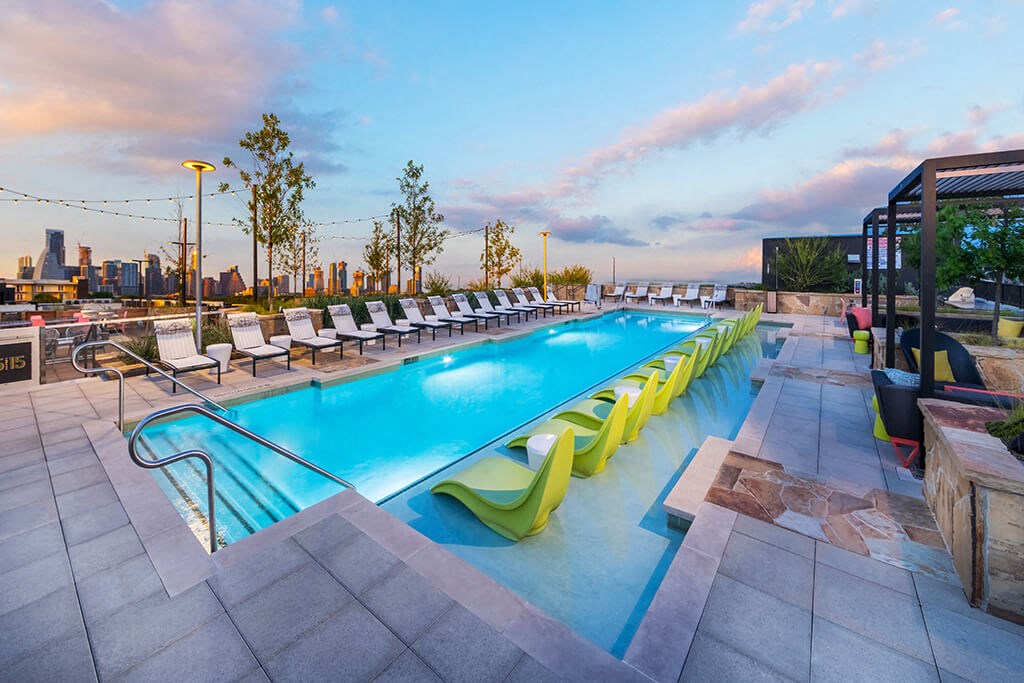 the pool at the envoy hotel has a view of the city