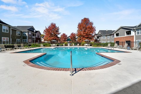 Pool surrounded by deck at Grand Oaks Apartments in Chester VA