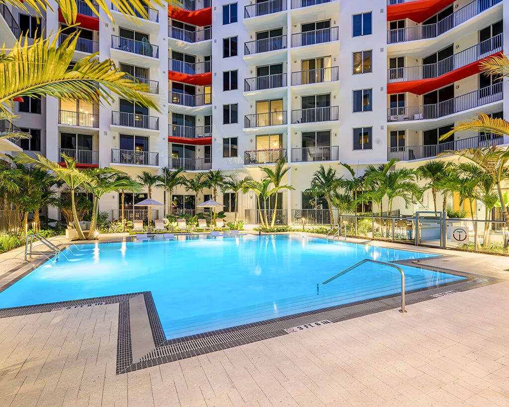 Swimming pool at dusk at Treo Apartments in Fort Lauderdale FL
