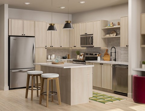 A kitchen with a refrigerator, microwave, oven, and sink.