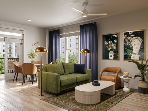A living room with a green couch and a white coffee table.