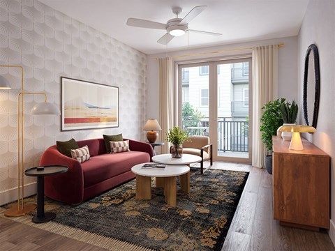 A living room with a red couch, a coffee table, and a painting on the wall.
