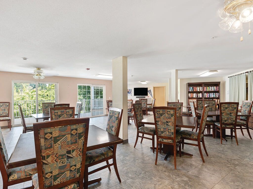 Resident lounge tables at Woodlands at Forbes Lake in Kirkland WA