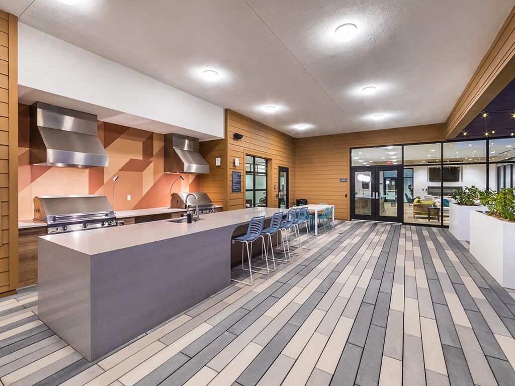 Rooftop Deck Grills at Dusk at Embark Apartments in Fremont CA