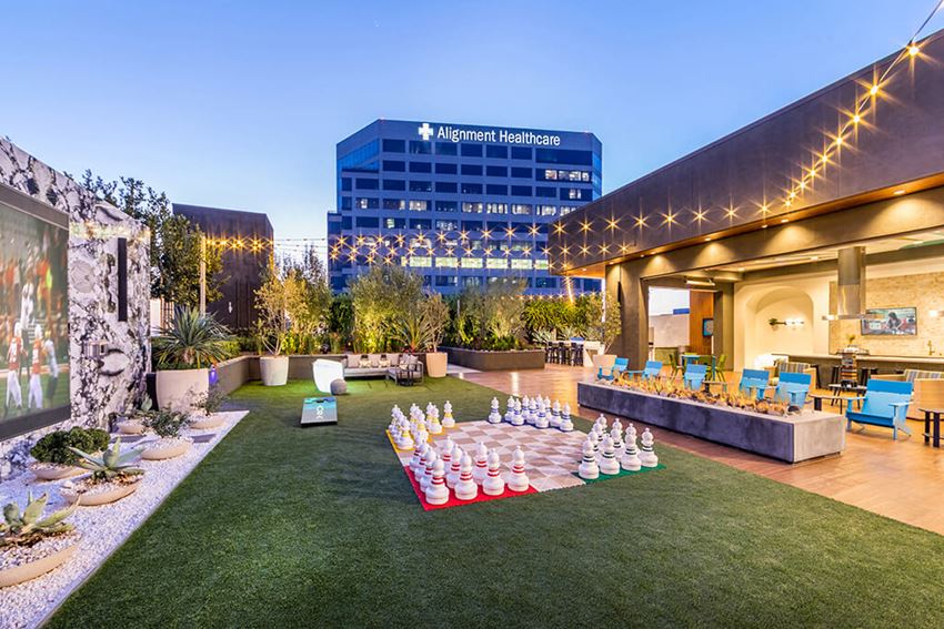 Rooftop Lounge Exhale at Dusk at Aura Apartment Homes in Orange CA. - Photo Gallery 1