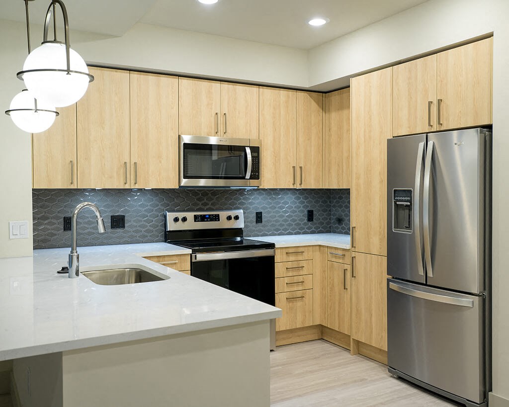 Sand Color scheme kitchen at Coasterra Apartments in Fort Lauderdale FL