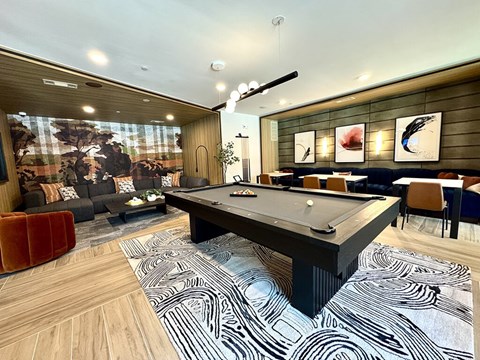 Social lounge game area kitchen at Heights at 1520 Apartments in Houston TX