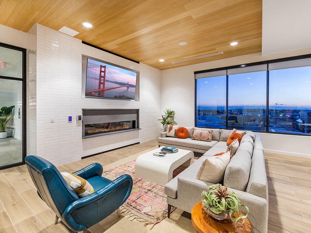 Social Lounge Seating Area and Fireplace at Embark Apartments in Fremont CA