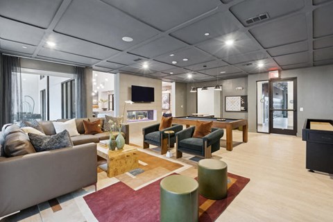 Social lounge game area at Luca Apartments in Austin TX