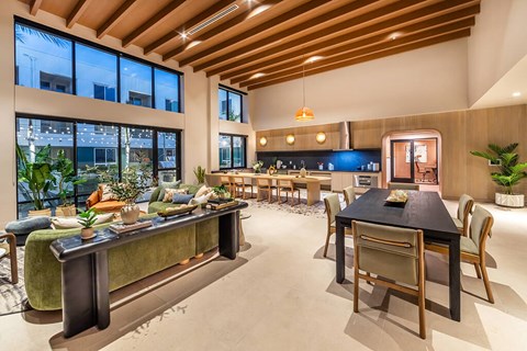 Social Lounge Seating and Kitchen at Dusk at Bowen Apartments in San Diego CA