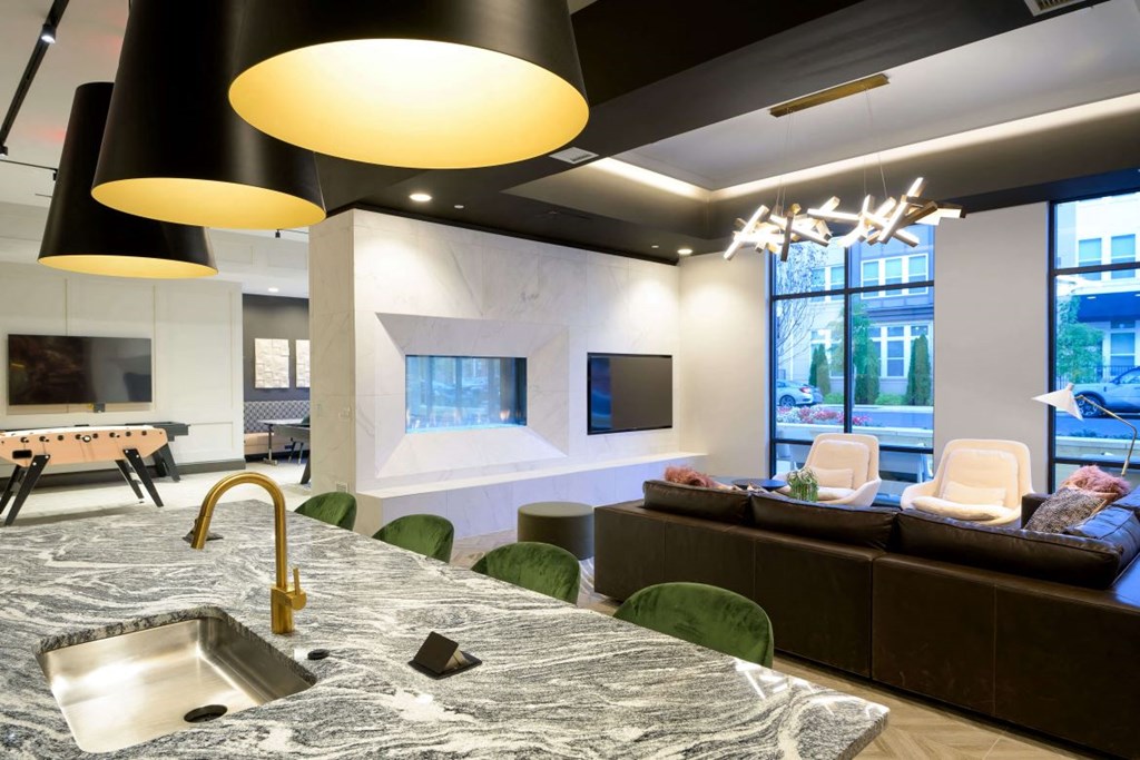 Social lounge and game room at The Moxley in Fairfax VA