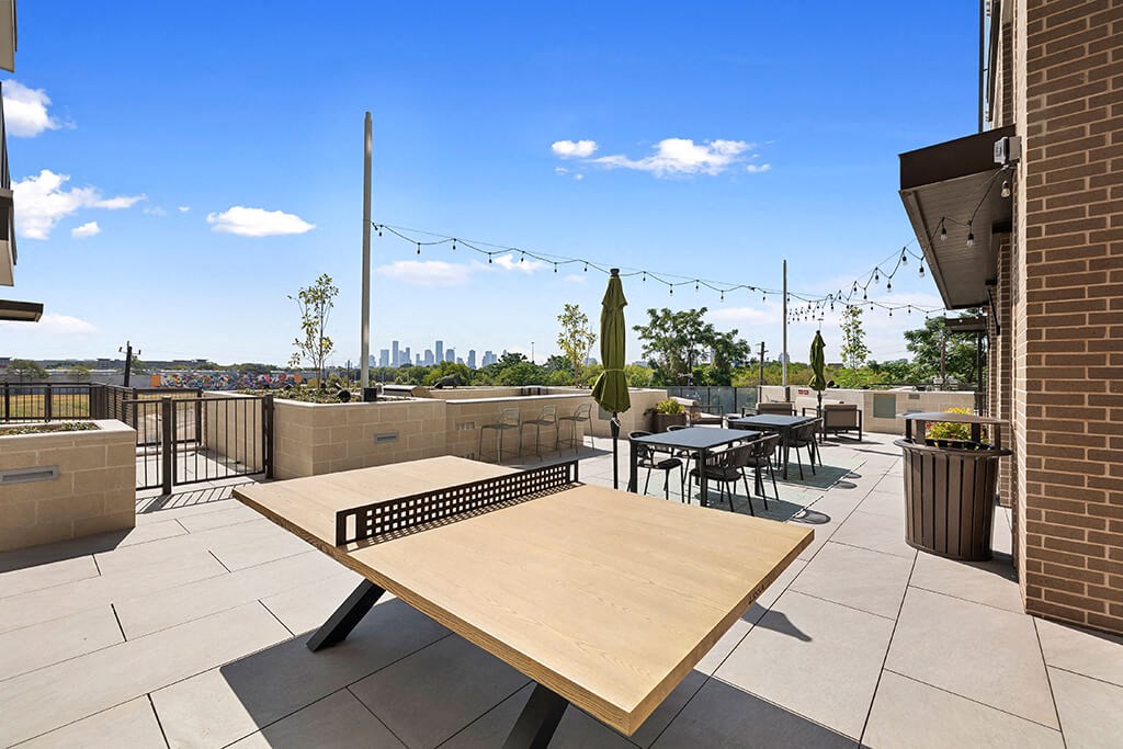 Social terrace ping pong at East Bend Apartments in Houston TX
