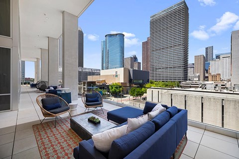 Social Terrace Seating Area Reverse View at 1810 Main Apartments in Houston TX