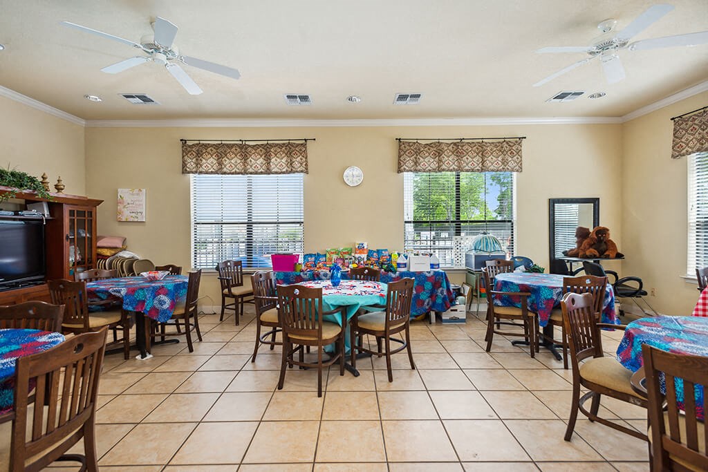 Social lounge tables at Parkway Senior Apartments in Pasadena TX