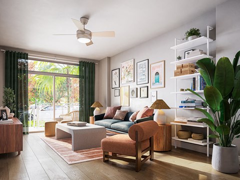 a living room filled with furniture and a large window