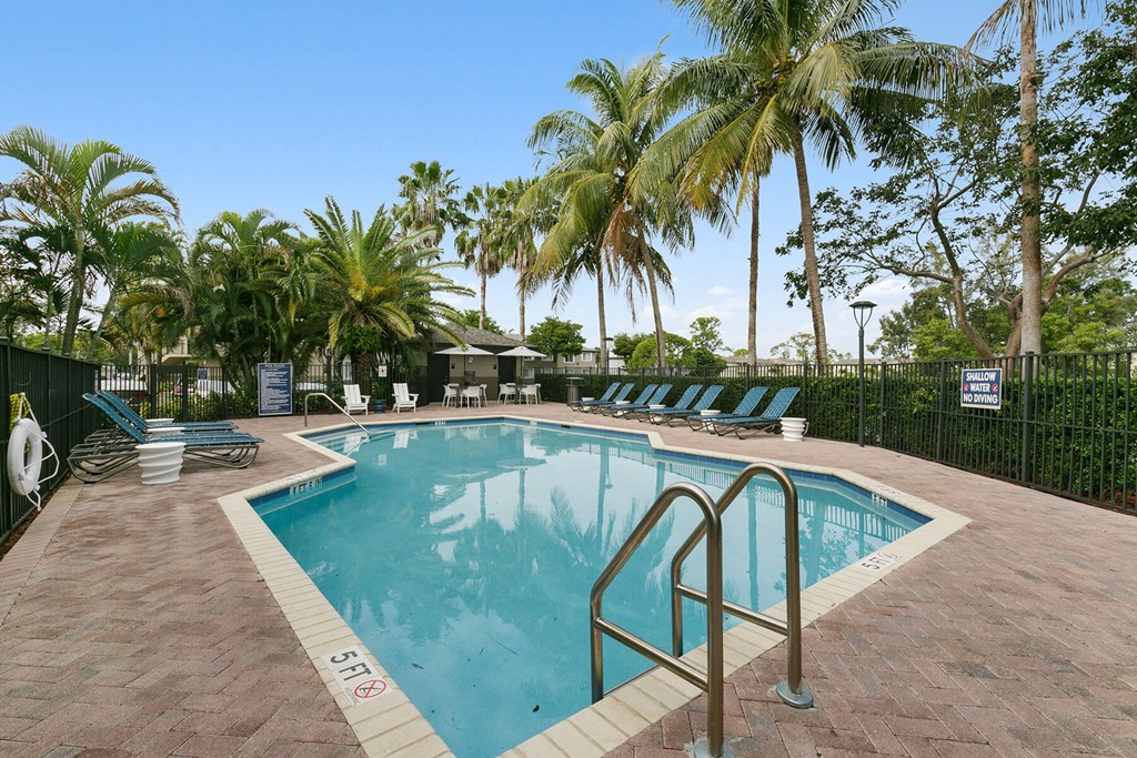 Outdoor Swimming pool at Brenton at Abbey Park Apartments in West Palm Beach FL