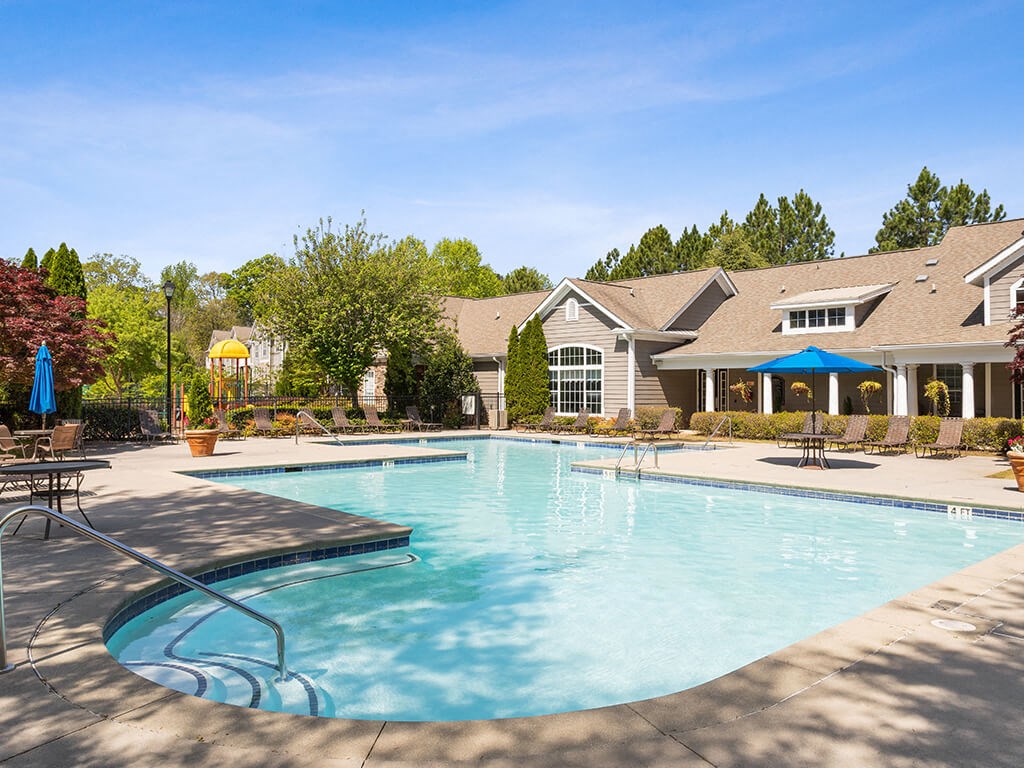 Swimming pool with lounge chairs at Lakeside Vista in Kennesaw GA