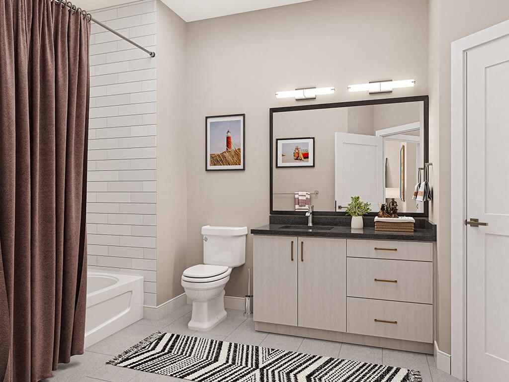 Bathroom with toilet and sink at West Village Poway Apartments in Poway CA