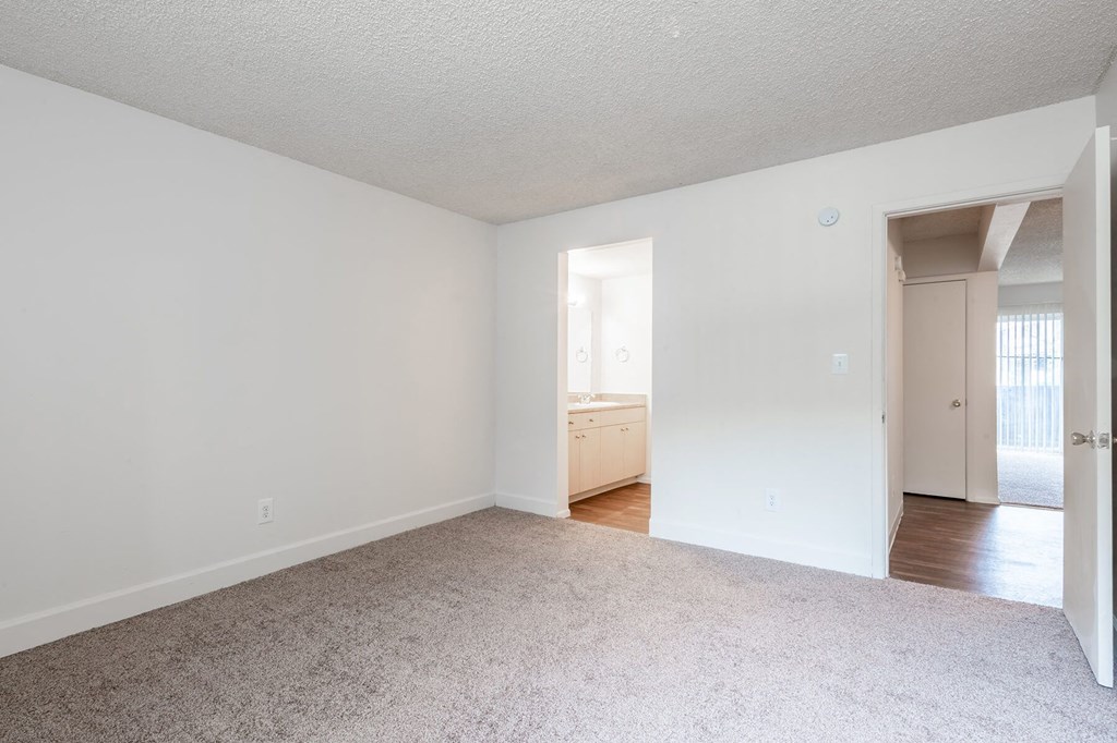 Vacant Bedroom and Bath at The Pine Apartments in Lakewood CO
