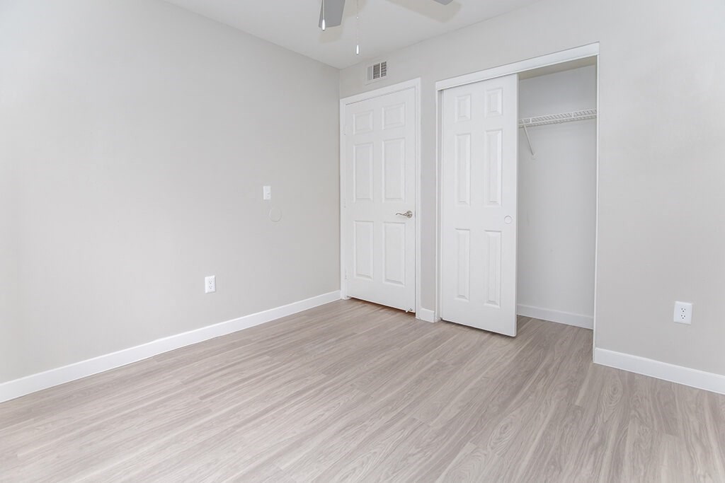 Bedroom with closet at Tides at Cheyenne Apartments in Las Vegas NV