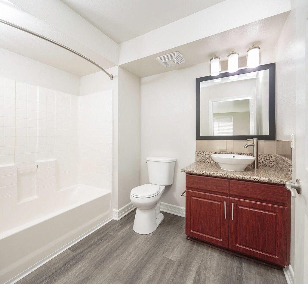 Vacant Cherry Cabinets Batrhoom at il Palazzo Apartments in San Diego CA