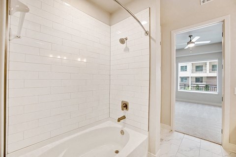Chrome Design Package Bathroom Shower at 1810 Main Apartments in Houston TX